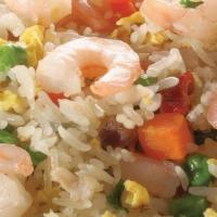Yeung Chow Fried Rice · Cooked with eggs, onions, peas, carrots, pork, shrimp & chicken in white rice.