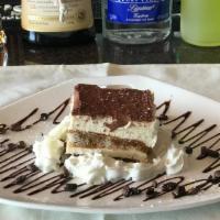Tiramisu Cake · alternating layers of mascarpone cream and espresso-dipped ladyfingers dusted with coca powder