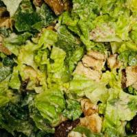Chicken Caesar Salad · Romaine lettuce, grilled chicken, croutons, parmesan cheese and Caesar dressing.
