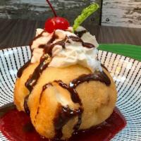 Fried Ice Cream · Served with chocolate and raspberry sauce. Please let use know if you have any dietary restr...