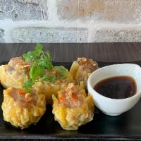 Thai Shrimp & Chicken Dumpling · Steamed or fried minced chicken and shrimp with mushroom, water chestnuts wrapped in wonton ...