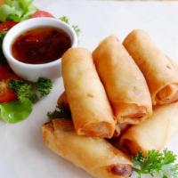 Crispy Spring Roll · Vegetarian. Deep fried rolls stuffed with vermicelli and vegetables served sweet chili sauce...