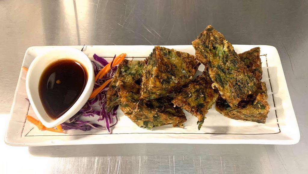 Chive Pancake · Vegetarian. Fried vegetarian chive pancake. Please let use know if you have any dietary restrictions or food allergies.