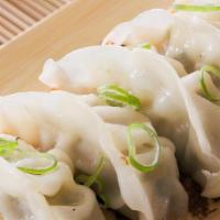 Veggie Dumpling · Vegetarian. Served with sweet soy vinaigrette. Steamed or fried. Please let use know if you ...