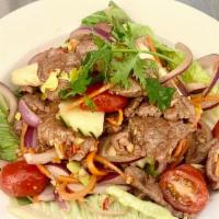 Beef Salad · Spicy. Slices of grilled beef tossed in spicy lime dressing onions, scallions, tomato, cucum...