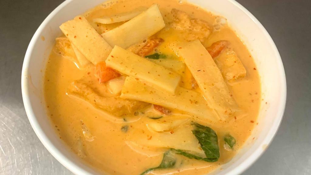 Red Curry · Spicy. Red curry paste with bamboo shoot, fresh basil and bell peppers simmered in coconut milk. Please let use know if you have any dietary restrictions or food allergies.