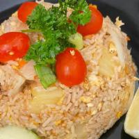 Pineapple Fried Rice · Stir fried with pineapple, onion, carrot, scallions, cashew nut and egg. Please let use know...