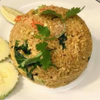 Yellow Fried Rice · Stir fried rice with curry powder, carrot, scallions onions, and egg. Please let use know if...