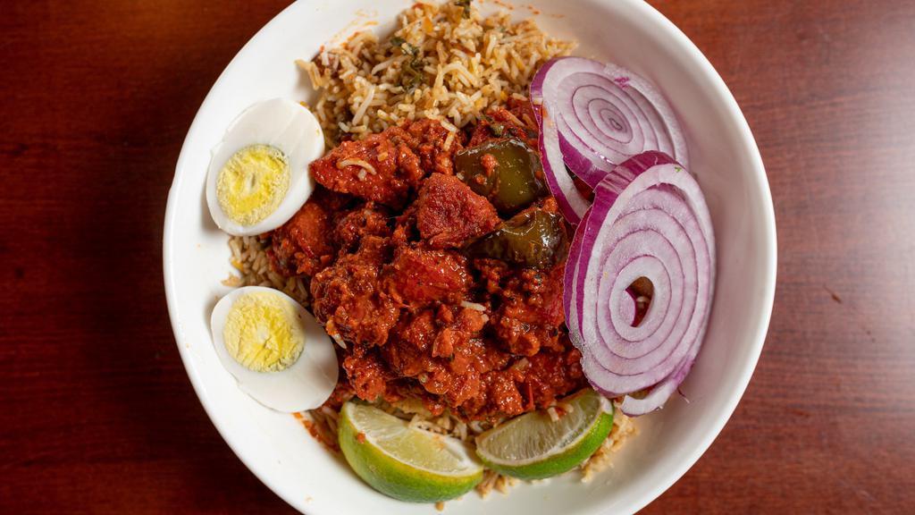 Dakshin Special Chicken Biryani · Basmati rice cooked with many spices/flavors, topped with special boneless chicken & boiled egg.