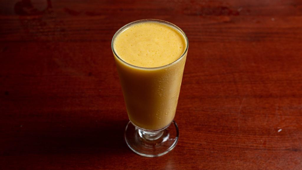 Mango Lassi · Yogurt and mango pulp blended with sugar.