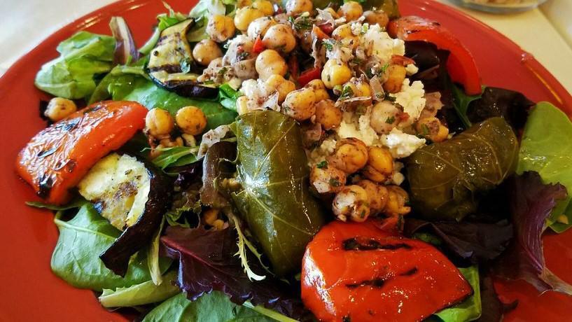 Garbanzo Salad · Fresh mesclun, walnuts, grape leaves, goat cheese, grilled eggplant and roasted red peppers.