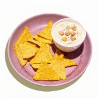 Homemade Hummus & Chips · Homemade with chickpeas, tahini, served with tortilla chips