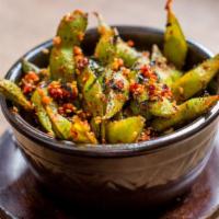 Edamame · Steamed edamame tossed in sea salt OR tossed in fried garlic, sesame chili oil, nori, and se...