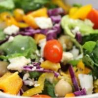 Middle Eastern Salad · Organic tomatoes, red onions, parsley, cucumbers, feta cheese, arugula, extra virgin olive o...