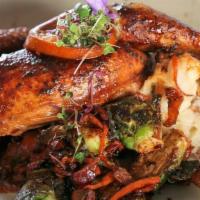 Roasted Chicken · ½ Free Range Chicken Boneless Marinated in Rosemary, Thyme, Garlic served with Broccoli, Pot...