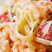 Linguini Shrimp Scampi · Marinated wild gulf shrimps, parsley, thyme, garlic, butter, white wine lemon sauce, and 5 m...
