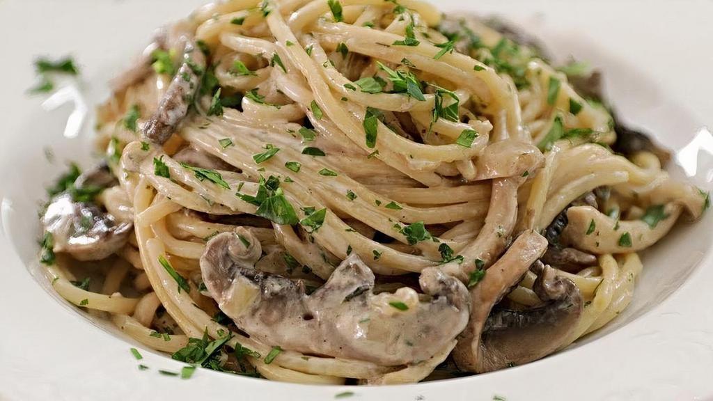 Wild Mushroom Linguini · Wild mushroom cream sauce, roasted garlic, and porcini butter. Served with fresh bread. Choice of optional protein and vegetable add-ons.