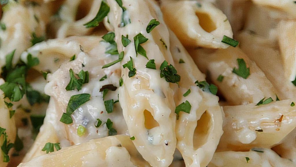 White Truffle Pasta · Penne pasta, heavy cream reduction, white truffle oil, 5 months Parmesan cheese, and parsley served with fresh bread. Served with fresh bread. Choice of optional protein and vegetable add-ons.