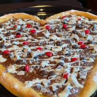 Heart Shaped Dessert Pizza · Get our dessert, heart shaped pizza for yourself or order one for your crush!
