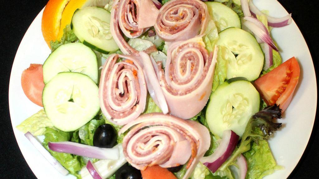 Antipasto Salad · Romaine lettuce, tomato, cucumber, black olives, ham, capicola, salami and provolone cheese.