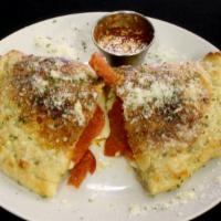 Cheese Calzone · Grande mozzarella cheese and ricotta. Choose up to 2 toppings. Extra toppings for an additio...