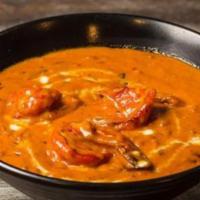 Shrimp Tikka Masala · Creamy tomato sauce and fenugreek.