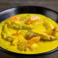 Shrimp Malai Curry · Shrimp, green mangoes, and panch poran.
