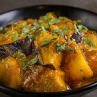 Achari Aloo Baigan · Spicy. Spiced pickled potatoes and eggplant.