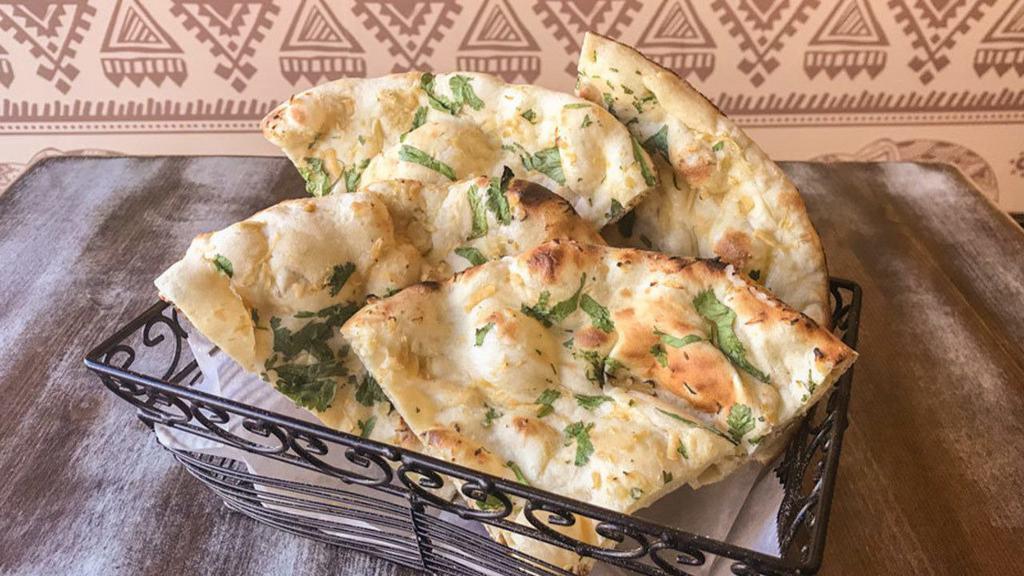 Garlic Naan · Most Popular. Freshly prepared in our tandoor.