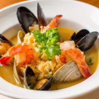 Sopa De Mariscos · Seafood soup with mussels, clams, fish, and shrimp.