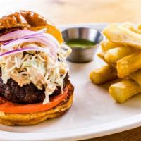 Chimi Burger · Black Angus beef, tomato, red onion, and dominican slaw served with yuca fries or french fri...