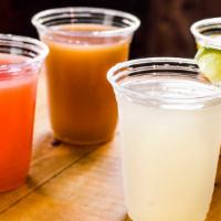 Fresh Juices · Choose from Chinola (Passion fruit) or Limonada (Lemonade)