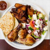 Half Chicken · Served With pita bread and side orders.