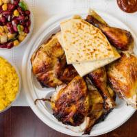 1 Whole Chicken · With any four side orders and pita bread.