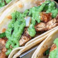 Pollo Asado · Marinated grilled chicken breast, charred onions, poblano rajas, cilantro, tomatillo avocado...