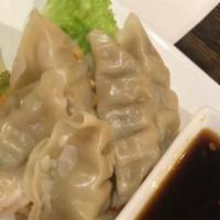 Thai Dumplings · Meat (blend of chicken and pork) or veggie. Served with sweet soy dipping sauce. Can be stea...