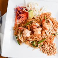 Pad Thai · Gluten free. Traditional thai rice noodle with egg, bean sprouts, scallions, peanuts and cho...