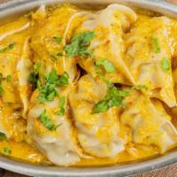 Jhol Momo · Steamed dumplings with minced chicken or paneer cottage cheese filling in an unflavored wrap...