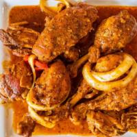 Pollo Guisado Orden · Chicken stew.
