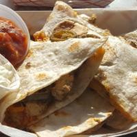 Chicken Quesadilla · Cheese quesadilla stuffed with seasoned grilled chicken breast. Served with salsa and sour c...