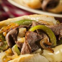 Philly Cheese Steak · Juicy beef or chicken, sauteed onions, bell peppers, cheddar jack cheese, served with garlic...