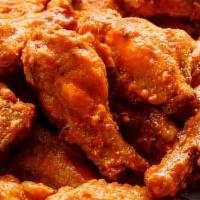 Chicken Wings · Your choice of Buffalo, BBQ, or Blue cheese dressing on the side.
