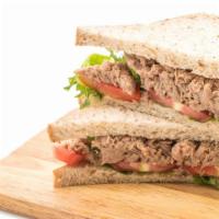 Tuna Melt Sandwich · Delicious sandwich made with seasoned tuna and your choice of melted cheese and bread. Serve...