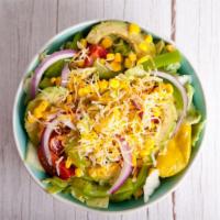 Tex Mex Salad · Crisp salad made with romaine lettuce, tomatoes, peppers, carrots, and jalapeños with a bals...