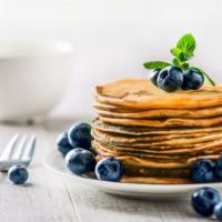 Buttermilk Pancakes With Blueberries · 3 pieces of freshly prepared Pancakes. Topped with fresh blueberries.