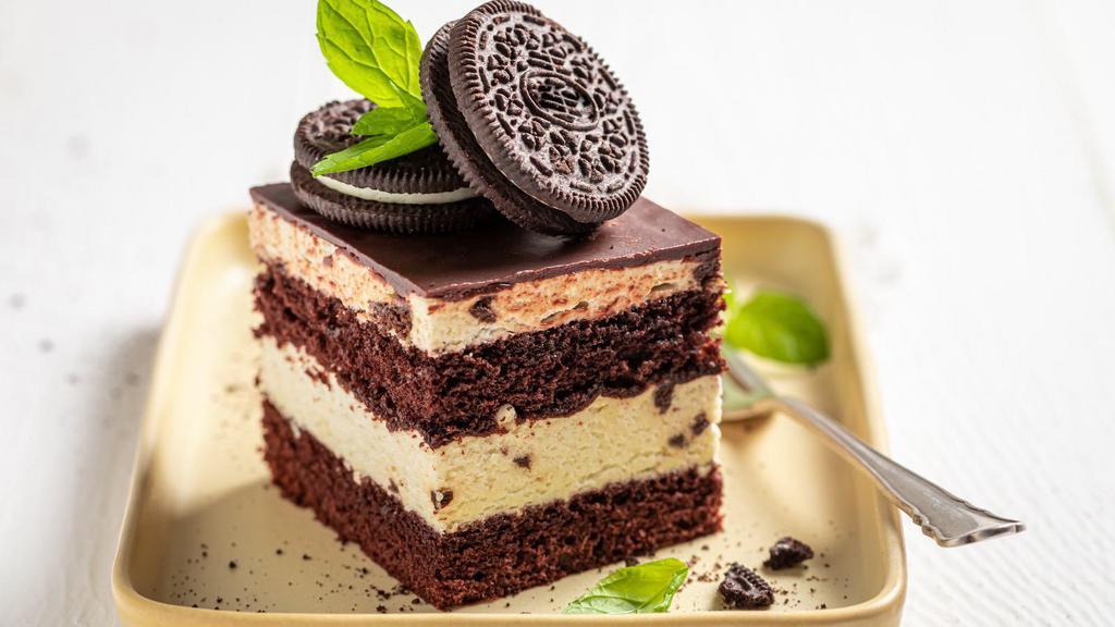 Oreo Mousse Cake · Delicious white chocolate cake filled with chunks of Oreo cookies!
