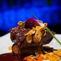 Short Ribs · Slow-braised Angus beef short ribs with Japanese BBQ sauce.