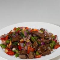 Cube Filet Mignon · Mongolian filet mignon with chorizo, piquillo pepper, basil, and soy maggi black pepper sauce.