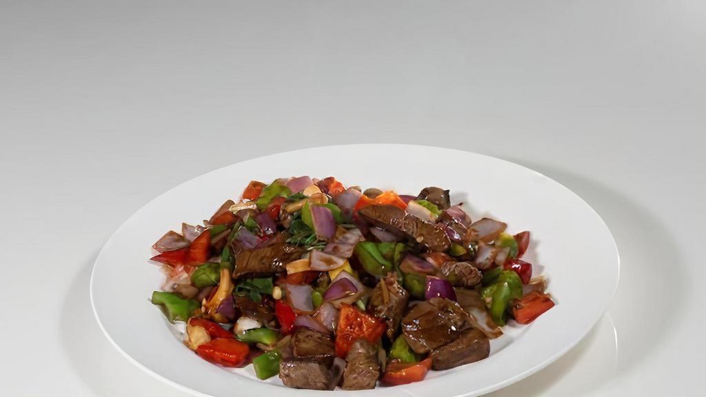 Cube Filet Mignon · Mongolian filet mignon with chorizo, piquillo pepper, basil, and soy maggi black pepper sauce.