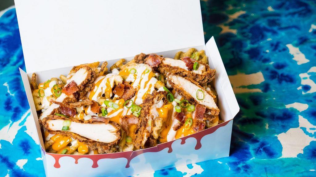 Fully Loaded Fries · Crispy Golden Waffle Fries, Habanero-Brined Chicken Strips, Spicy Cheese Sauce, Bacon, Ranch, Scallion. [🔥]